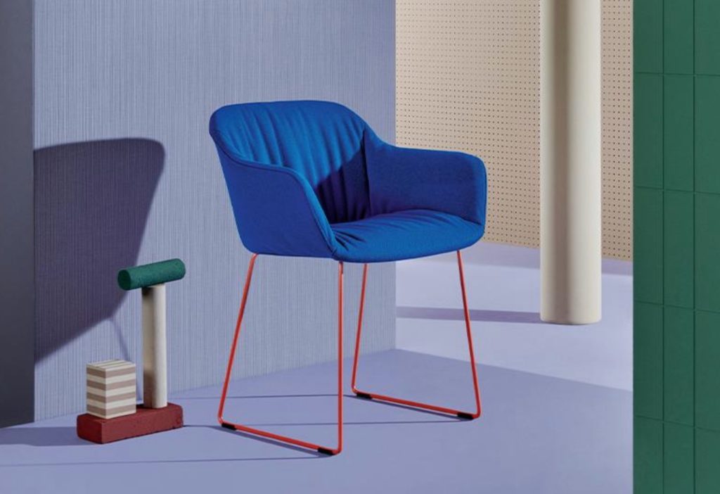 Babila XL chair with blue fabric cover and orange sled base