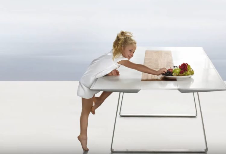 Extrados Table with girl reaching for fruit