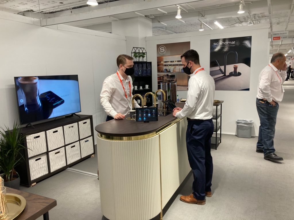 TopBrewer live at NeoCon serving coffee