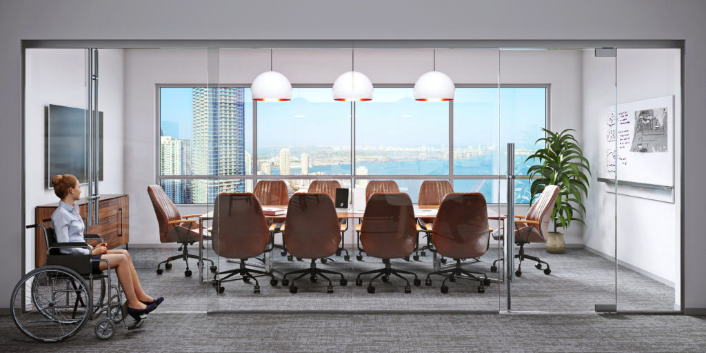 ADA-compliant rendering of woman in wheelchair and glass door system with top-locking ladder pulls