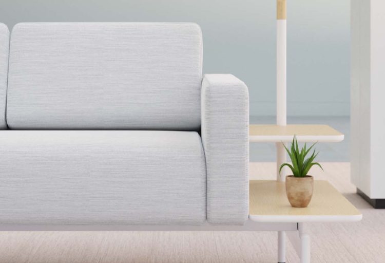 Embra detail of light gray couch, side table and lamp