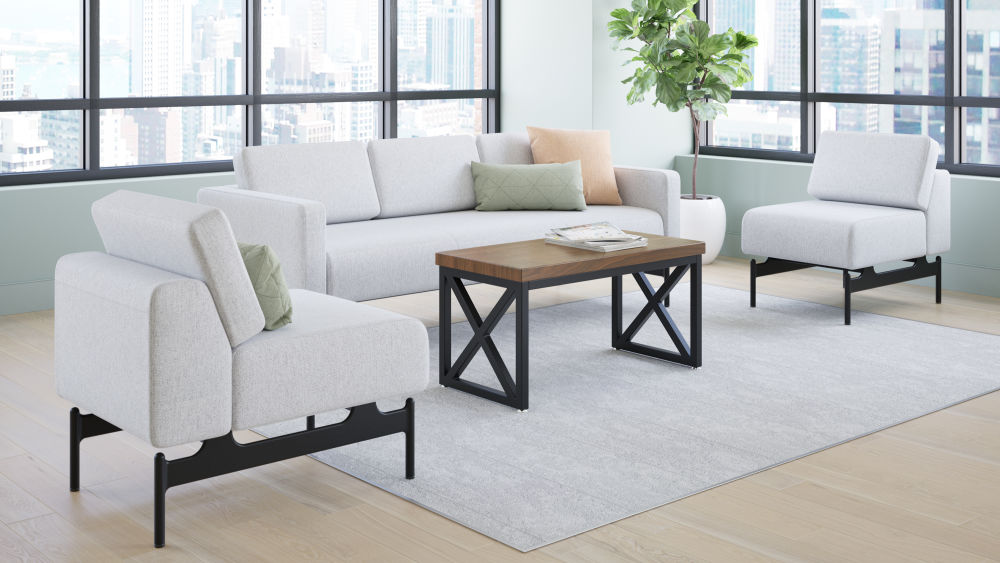 Embra two lounges and sofa in light gray with coffee table in light-filled room with city view
