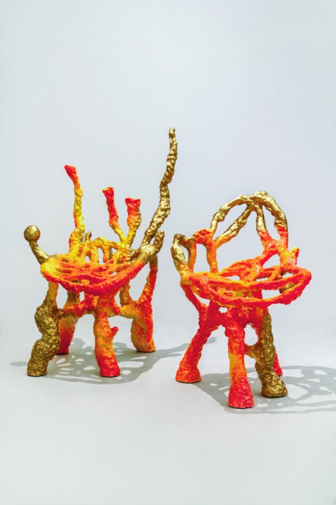 Launch Pad chairs that appear to be melting in neon colors
