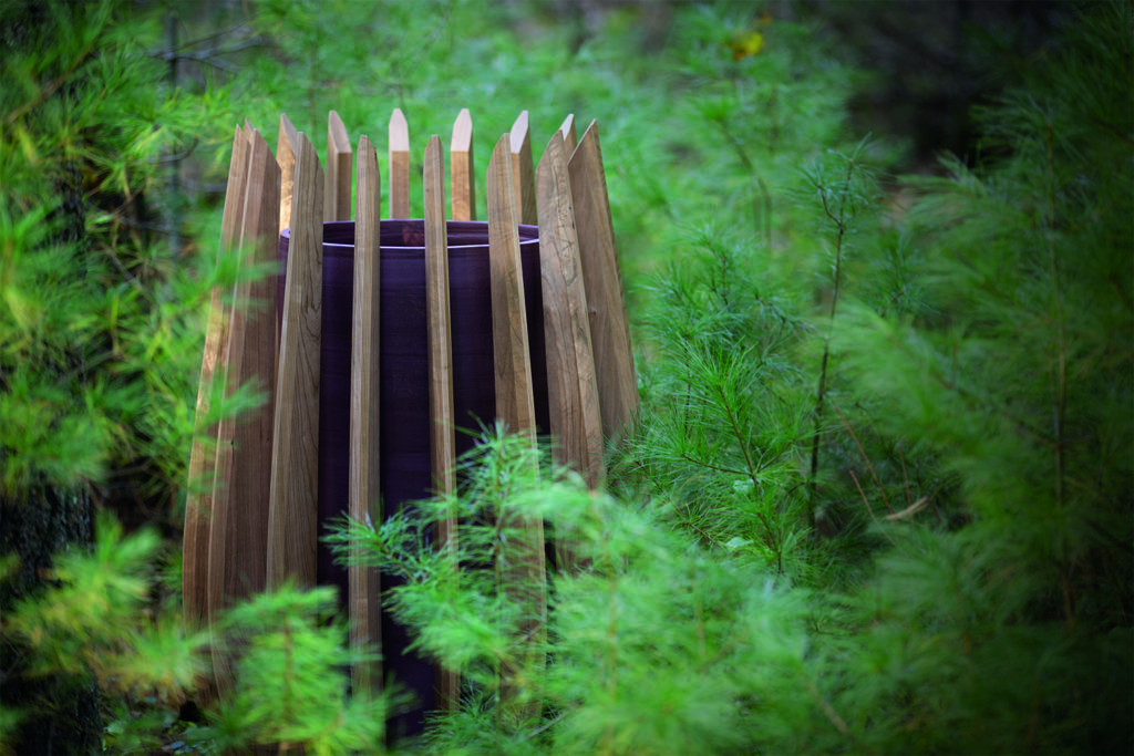 Concordic tall planter in the woods