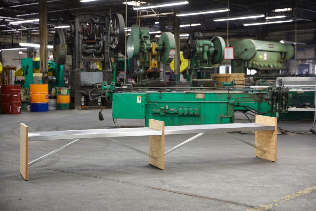 Emeco double truss bench in factory