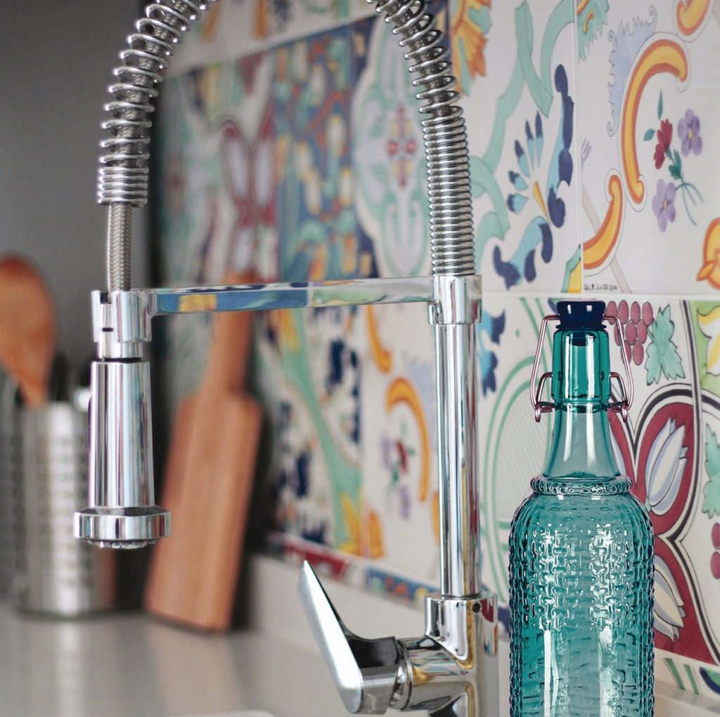Mèlange Ceramica tiles detail on wall behind kitchen faucet