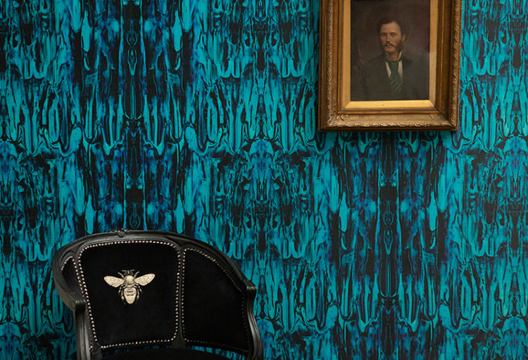 Timourous Beasties Gerhard Gum in room with chair and picture