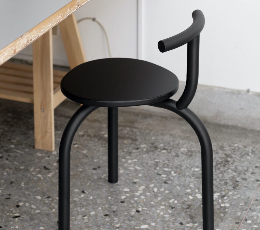 Ogle side view near wooden desk