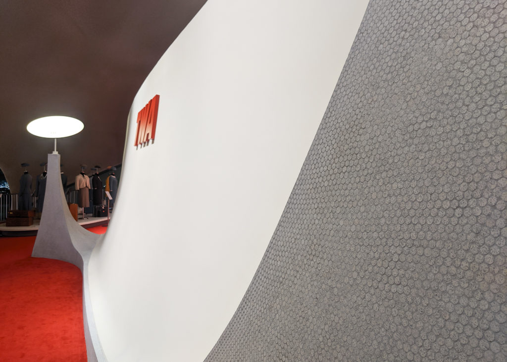 penny tiles on wall at TWA terminal