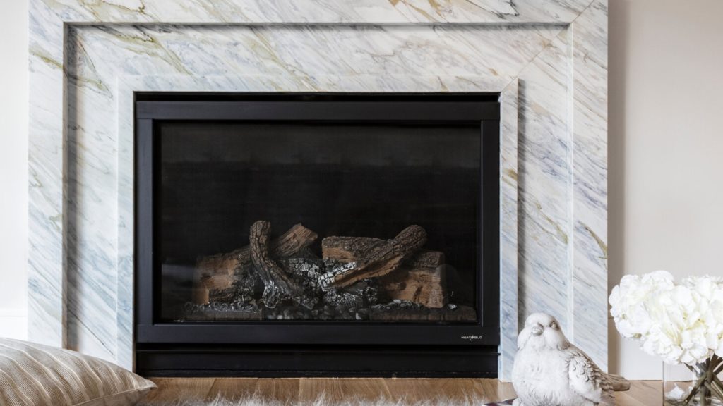 fireplace surround Calacatta Bluette white with streaks of blue and brown