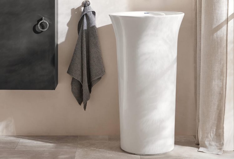 White Tulip pedestal vanity near medicine chest