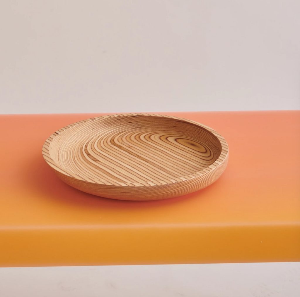 Timbur Tres final on orange surface
