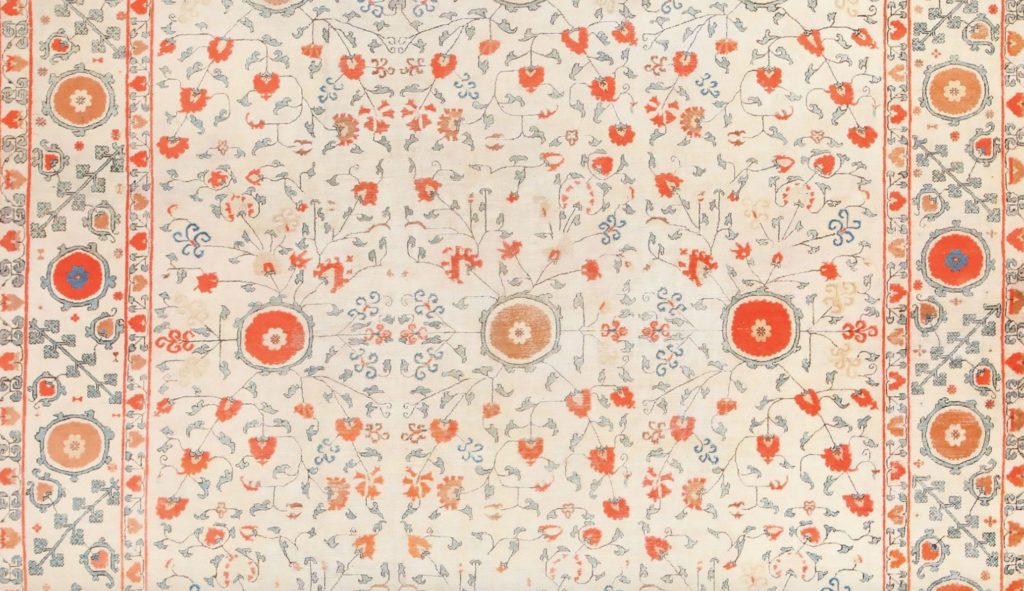 Nazmiyal Khotan rug with bright colors