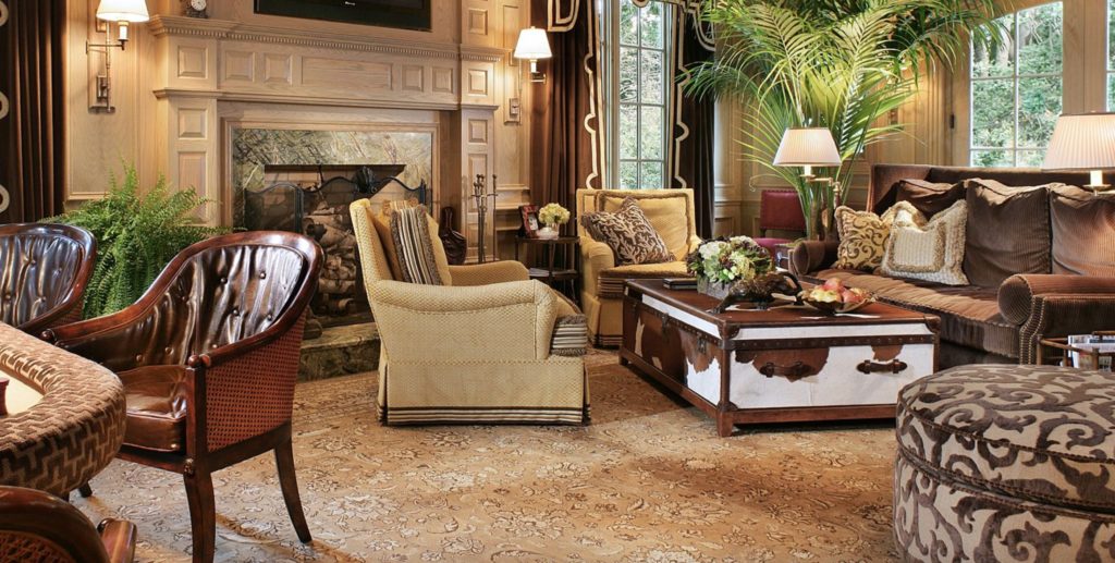 Nazmiyal antique Persian rug in upscale living room