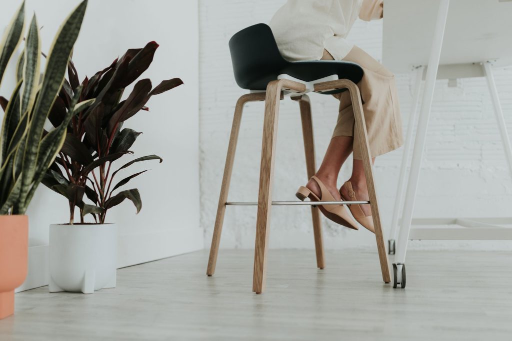 SpecStars Haworth Maari stool view of lower half with woman's legs