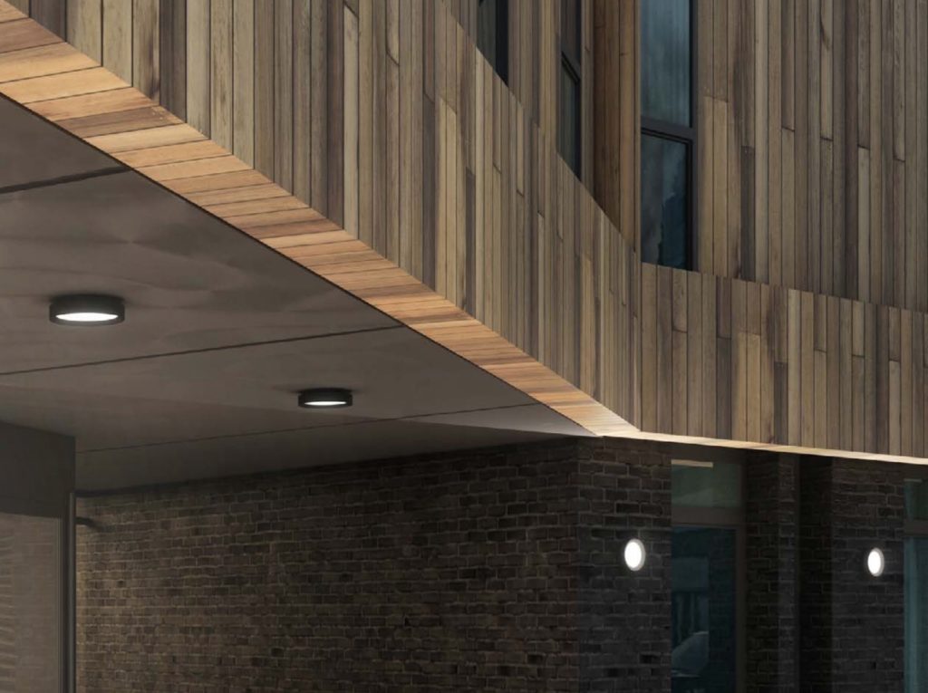 Scena round wall-mount lights on building