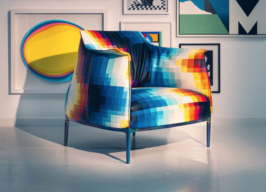 Archibald Chair side view with art on wall behind