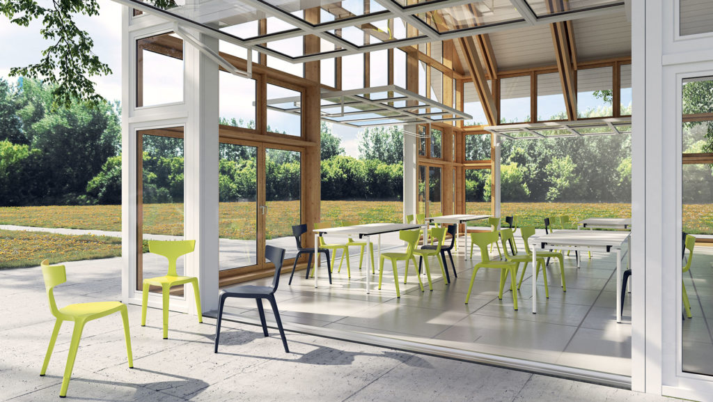 Stakki lime green and dark gray in sun room with open doors leading to patio