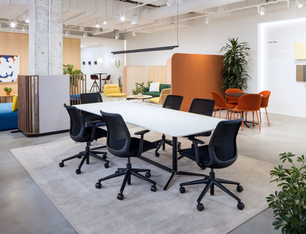 Stylex Click black chairs around conference table