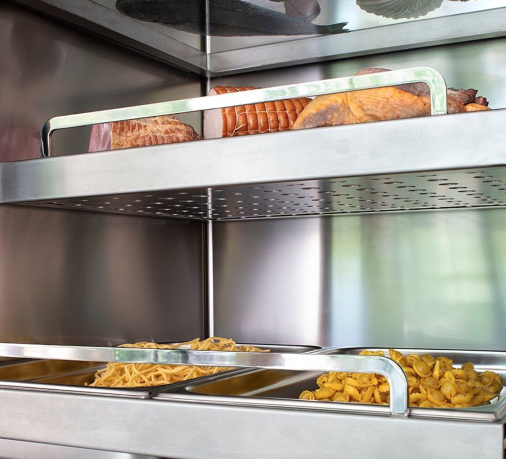 Inside fridge detail with food items
