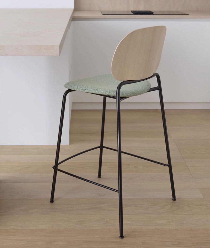 Upon Stool green upholstered seat and plywood back on metal frame.