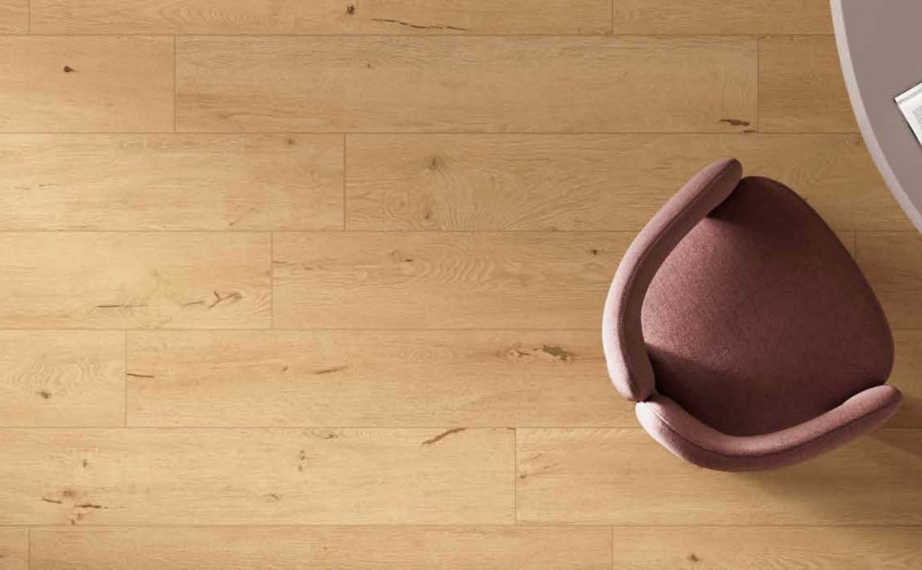 Overhead view hone-colored planks with chair