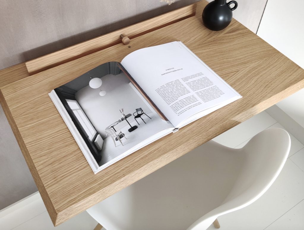 desk with open book, view from above