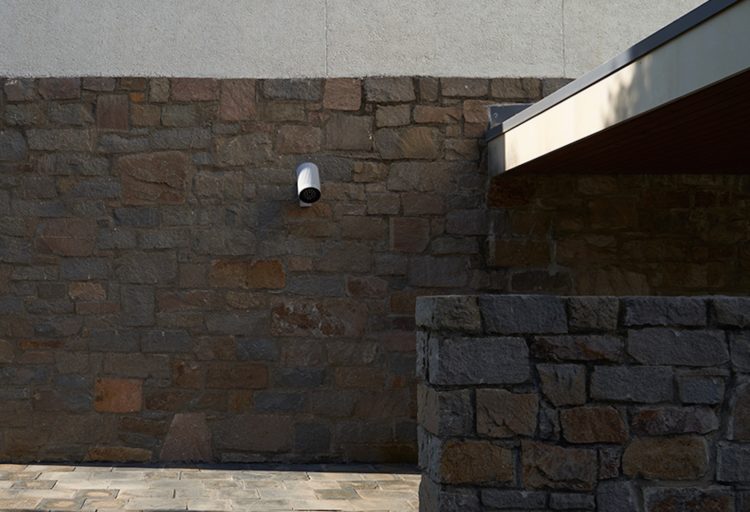 Gunnar Light wall mount on stone wall