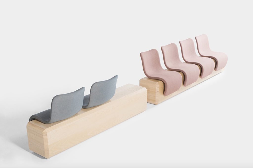 Ascent seating salmon and gray chairs facing opposing directions