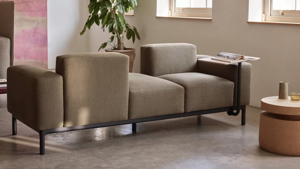 Edge Free brownish gray with black frame near round wooden table
