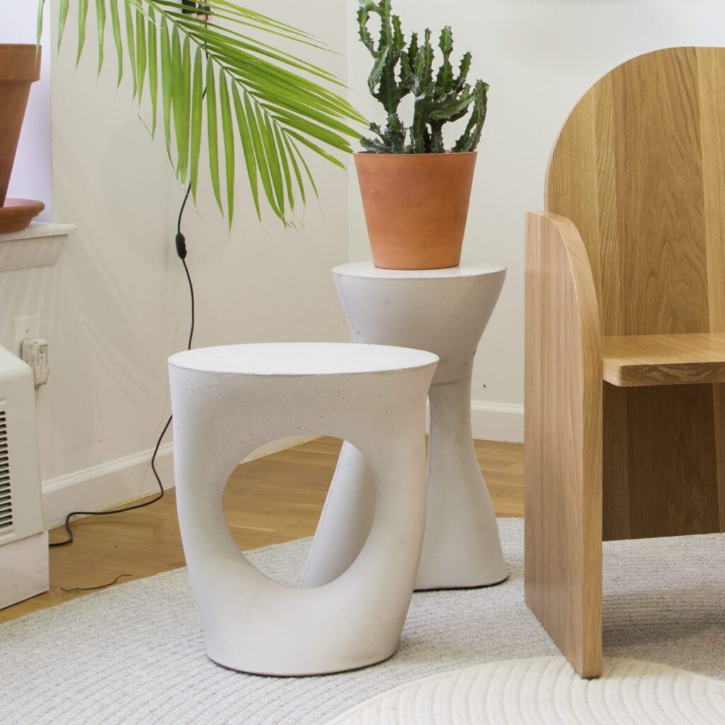 two Kreten tables near wooden study carrel