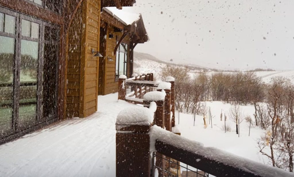 NanaWall glass walls in winter snowstorm