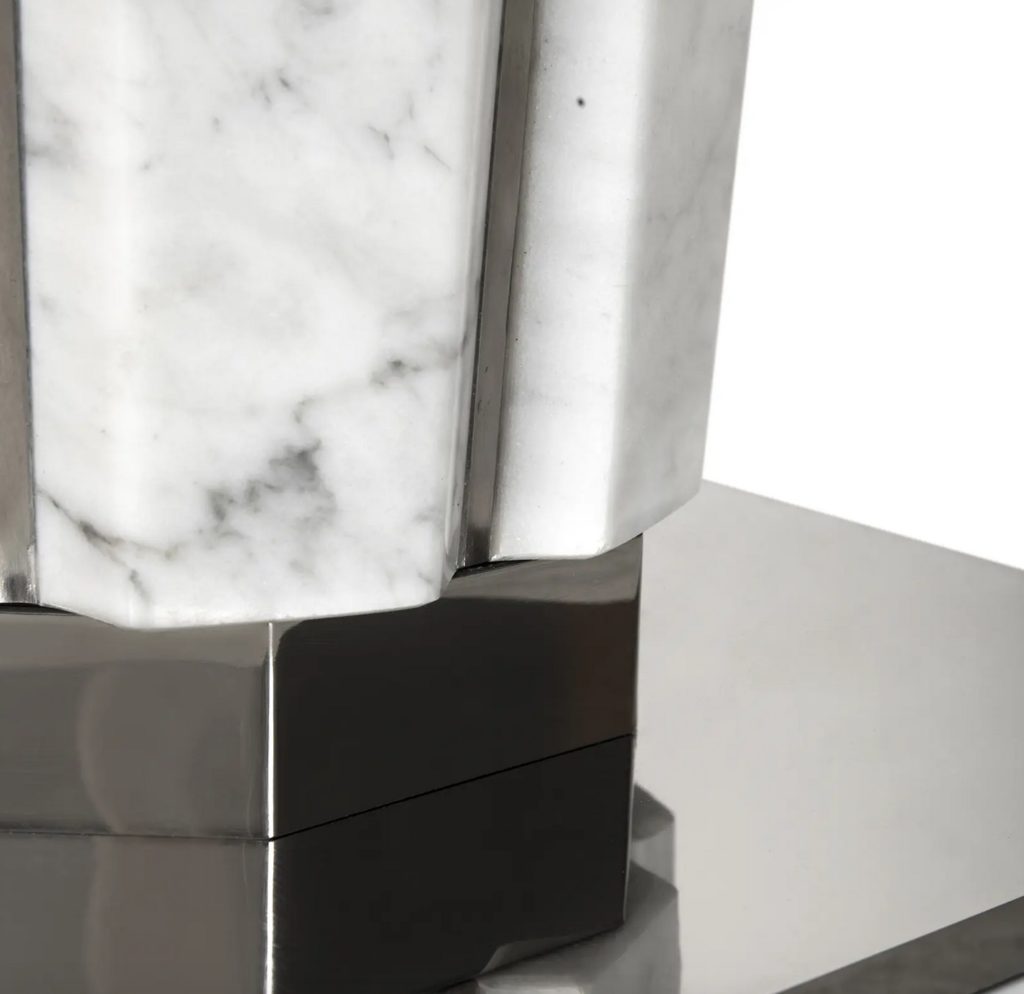 Suspicion table detail of inset steel and black base