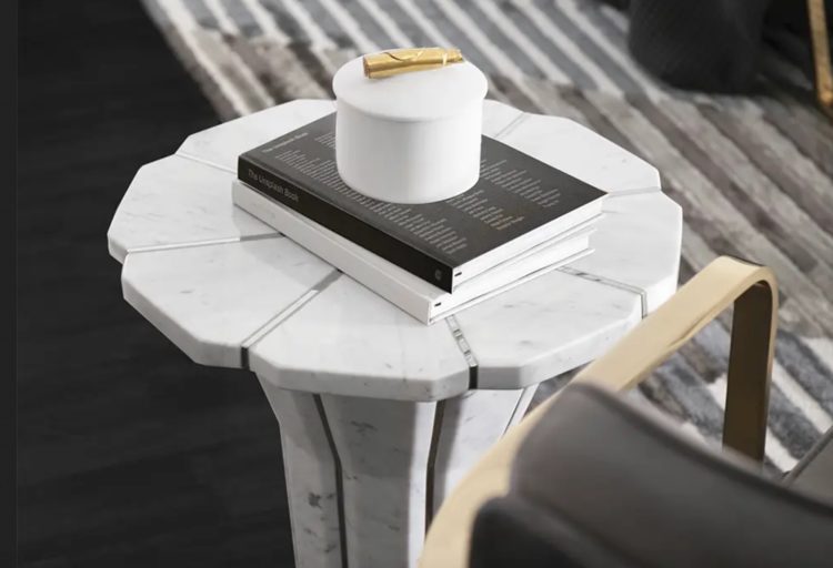 Suspicion table with books and paperweight