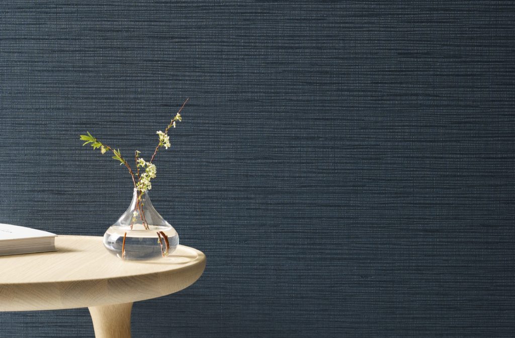 Carnegie fabric bluish/green near wooden table