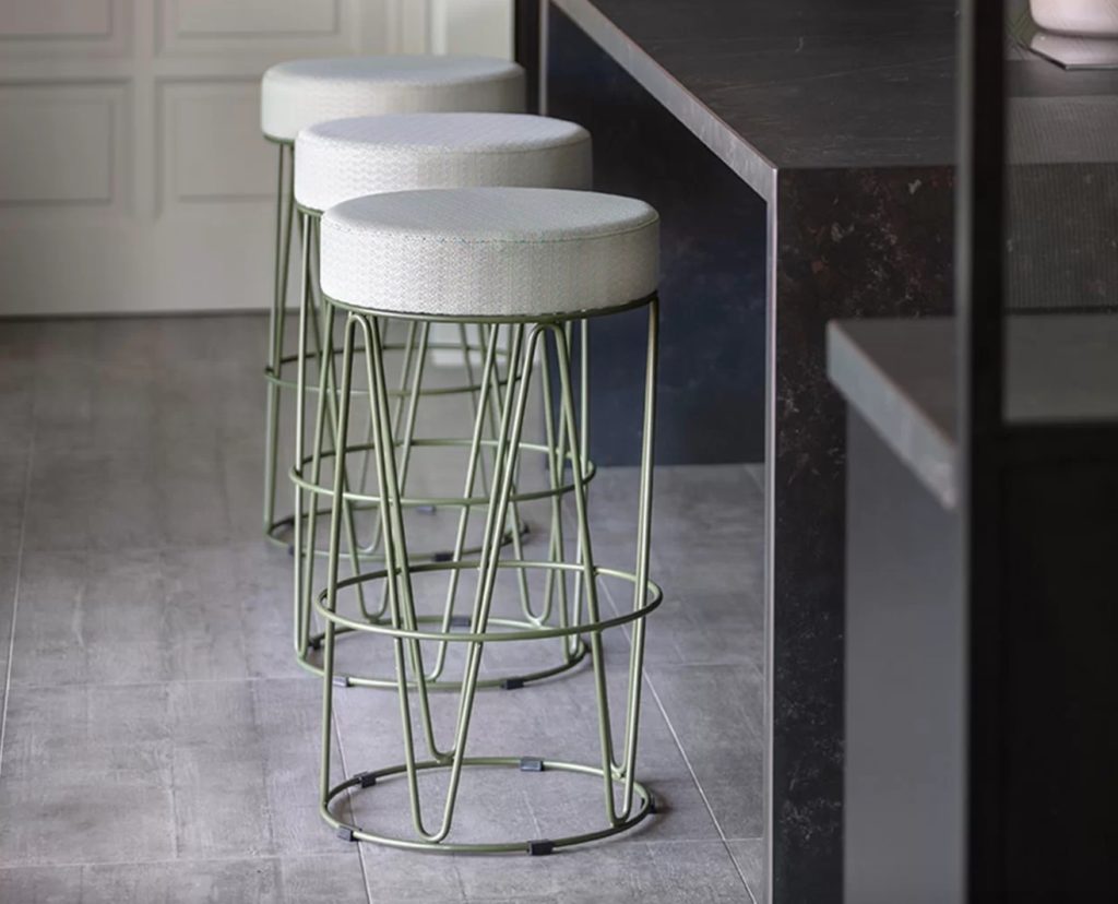 Lagarto stools with green frame and light gray cushion