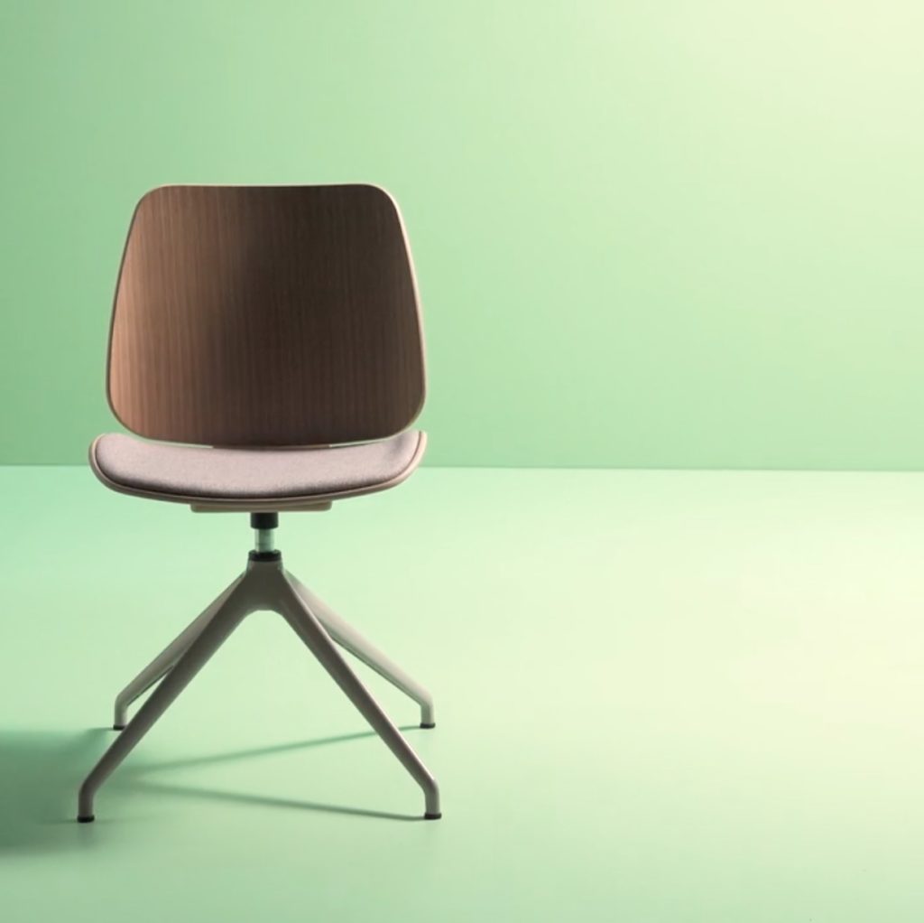 wood chair with foam upholstery and four star swivel base