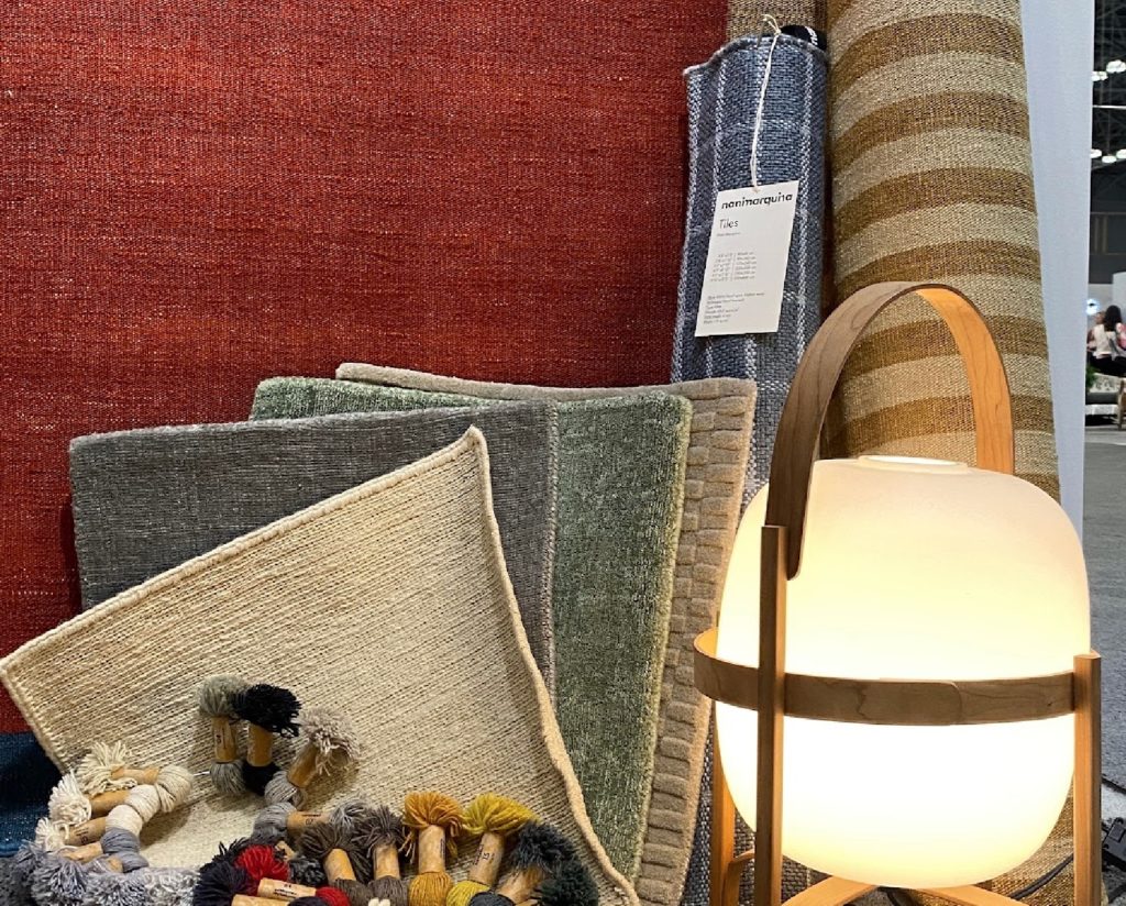detail of nanimarquina booth at BDNY with several rug samples