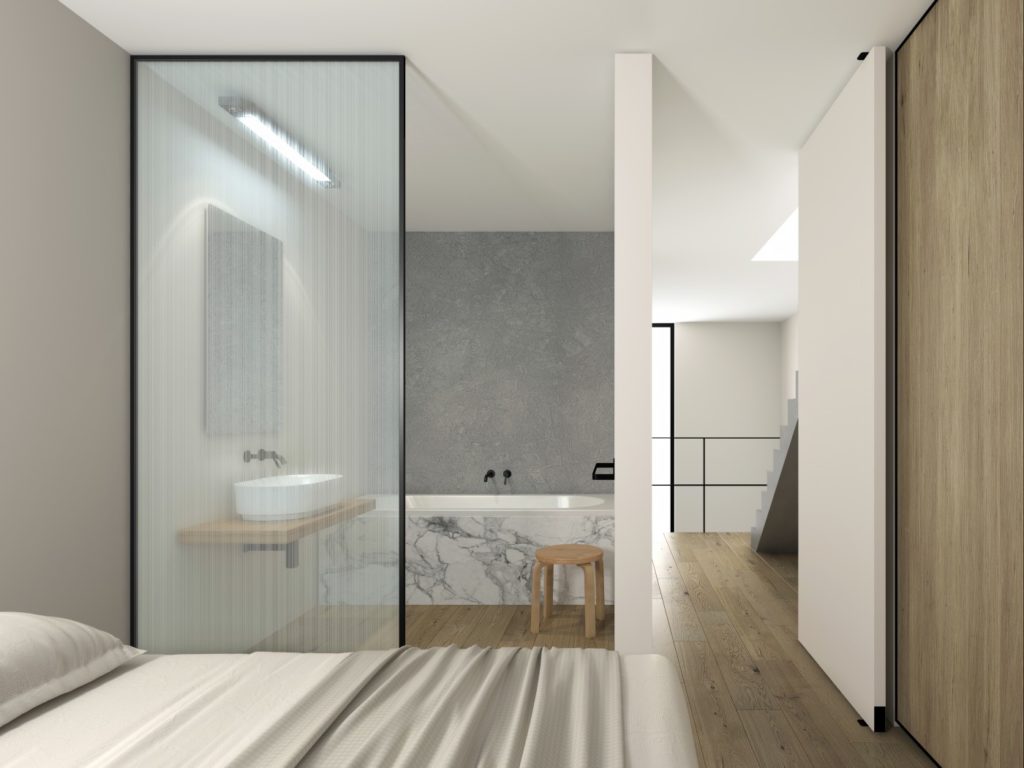 decorative glass on glass partition in hotel bathroom
