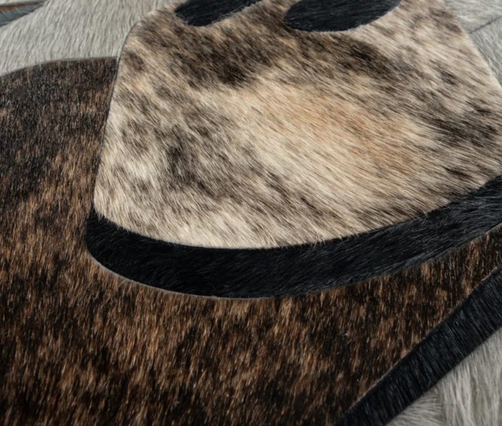 Close-in view Kyle Bunting hair on hide rug