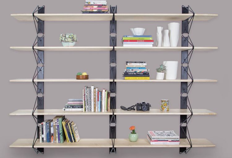Strut bookcase with books and lots of open shelving space