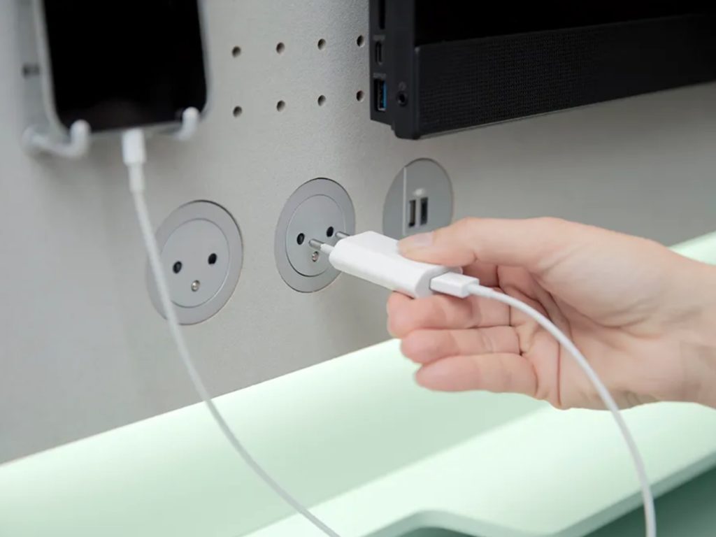 Detail of peg board module with integrated power