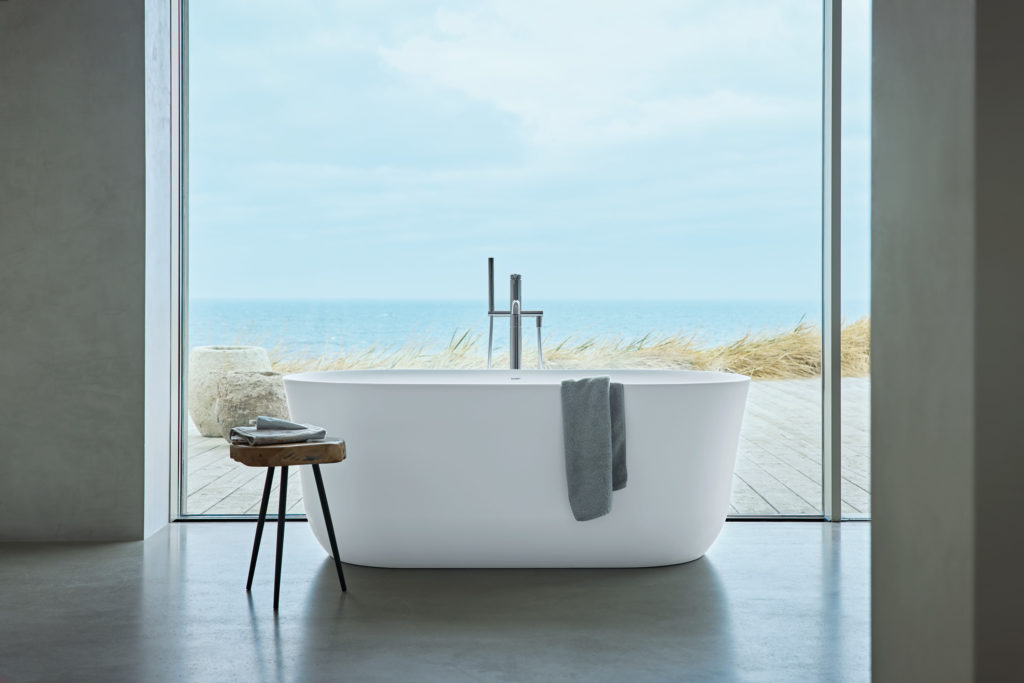 Starck Soleil bathtub in front of window looking out on ocean