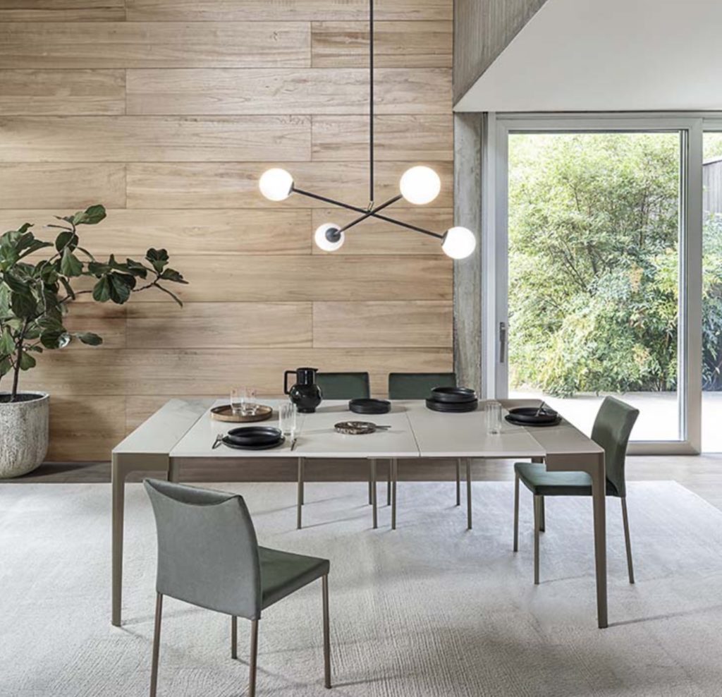 Corner collection extensible dining table with brown legs and off-white top