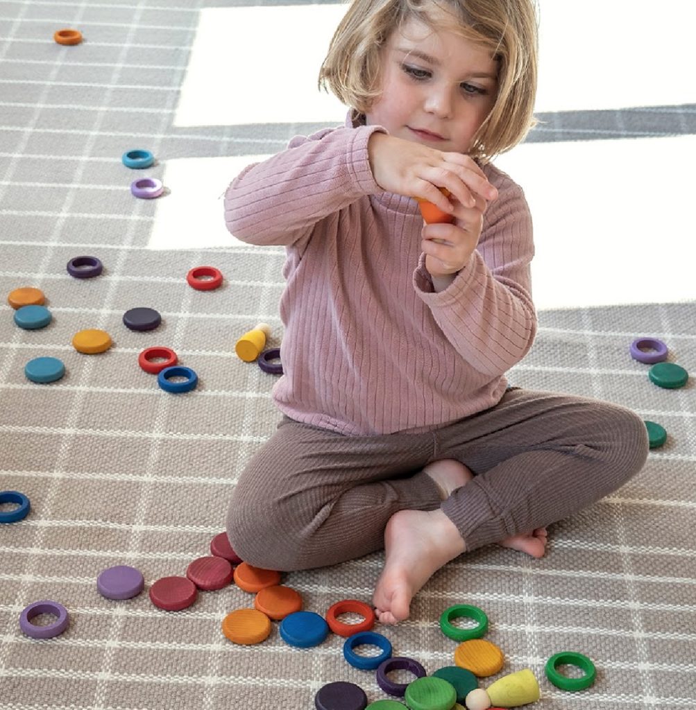 nanimarquina's Tiles with little girl playing