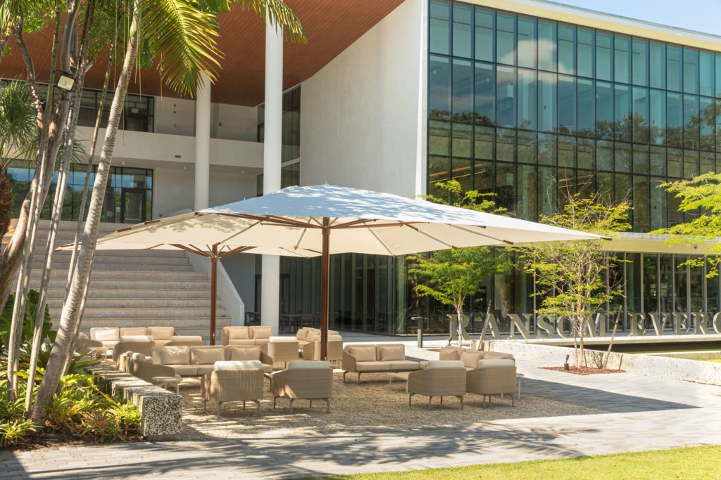 Mega Max outside office building with furniture beneath