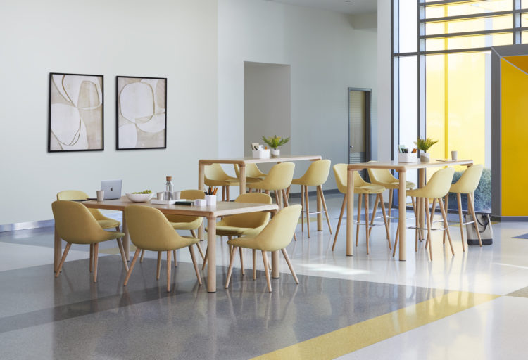 Cafe setting with three Conduit tables at different heights