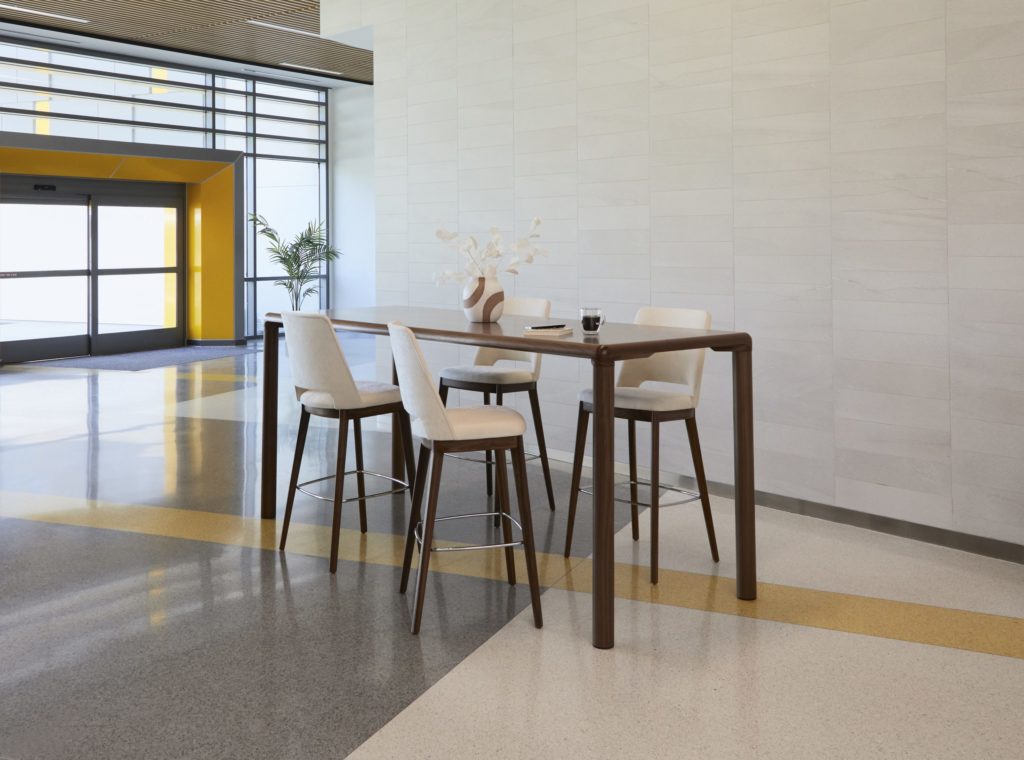 High table in walnut with four chairs