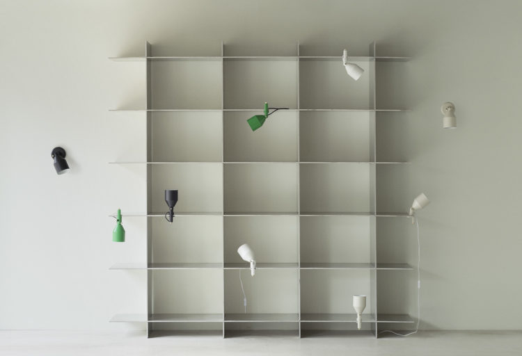 Klip lamps on bookshelf