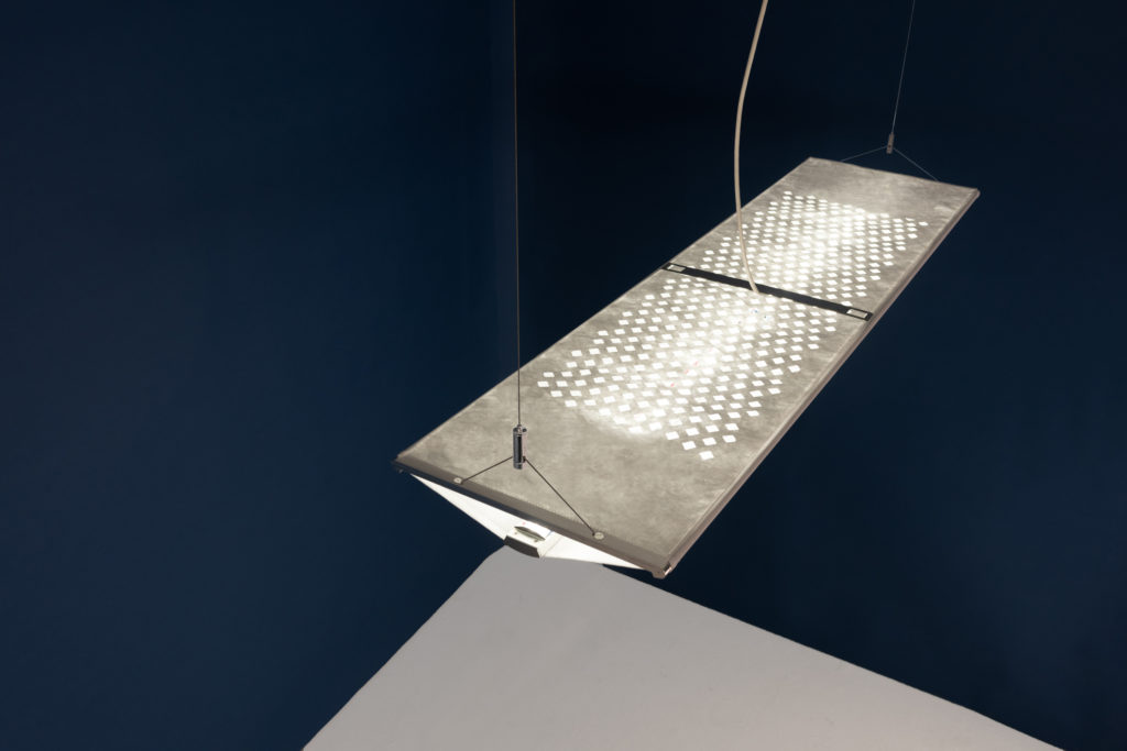 Wings view of top of fixture with perforated fabric